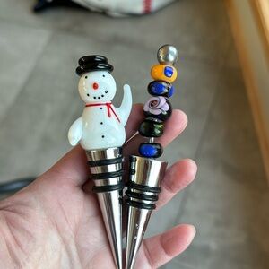 Two cute bottle stoppers